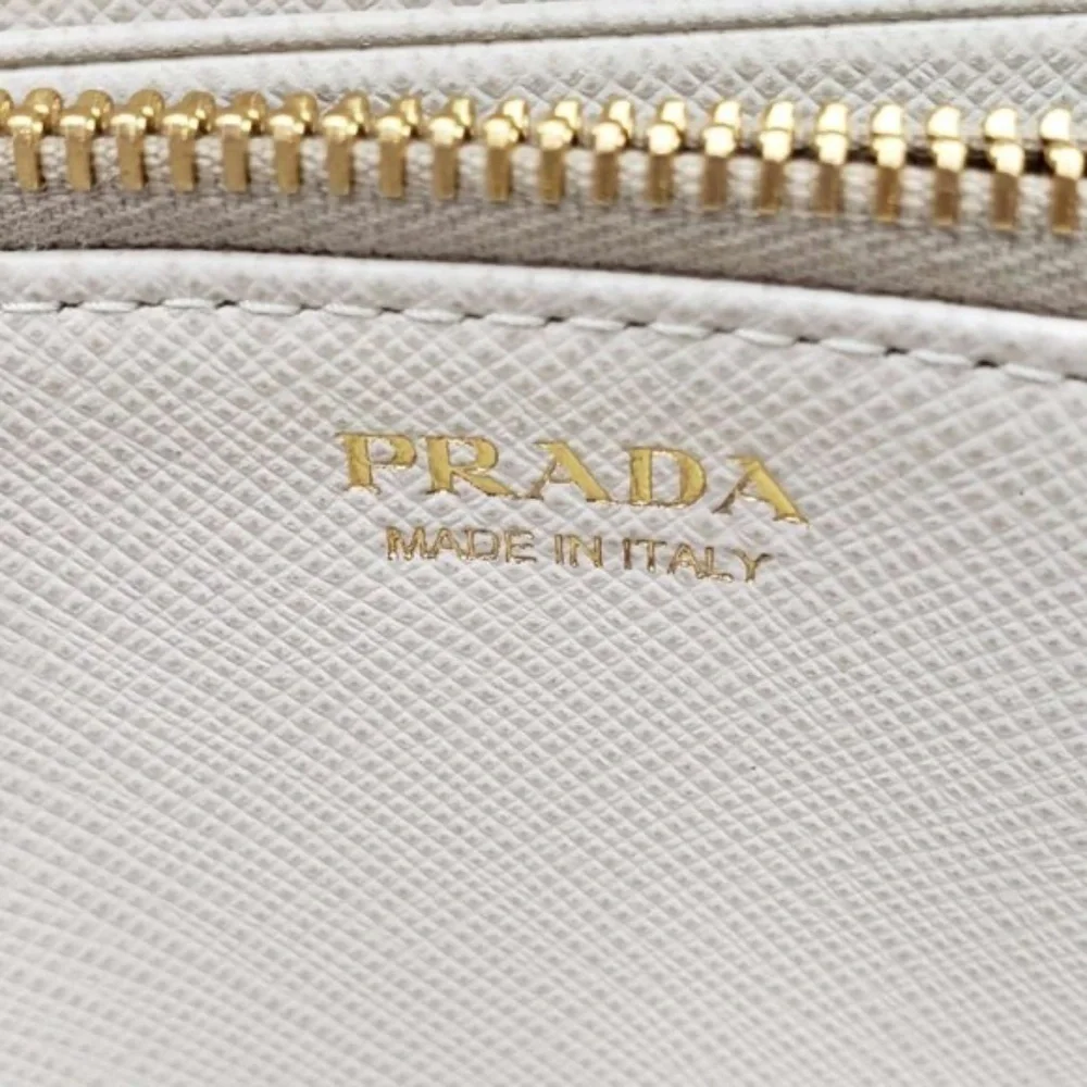 100% Authentic PRADA Saffiano Ribbon Leather Zippy Wallet